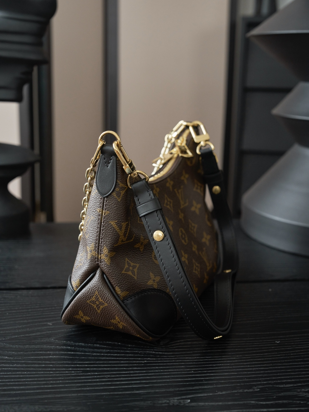Louis Vuitton Crafted from classic Monogram canvas, this small Boulogne handbag features a double-zip closure and a spacious interior flat pocket large enough to accommodate a smartphone.