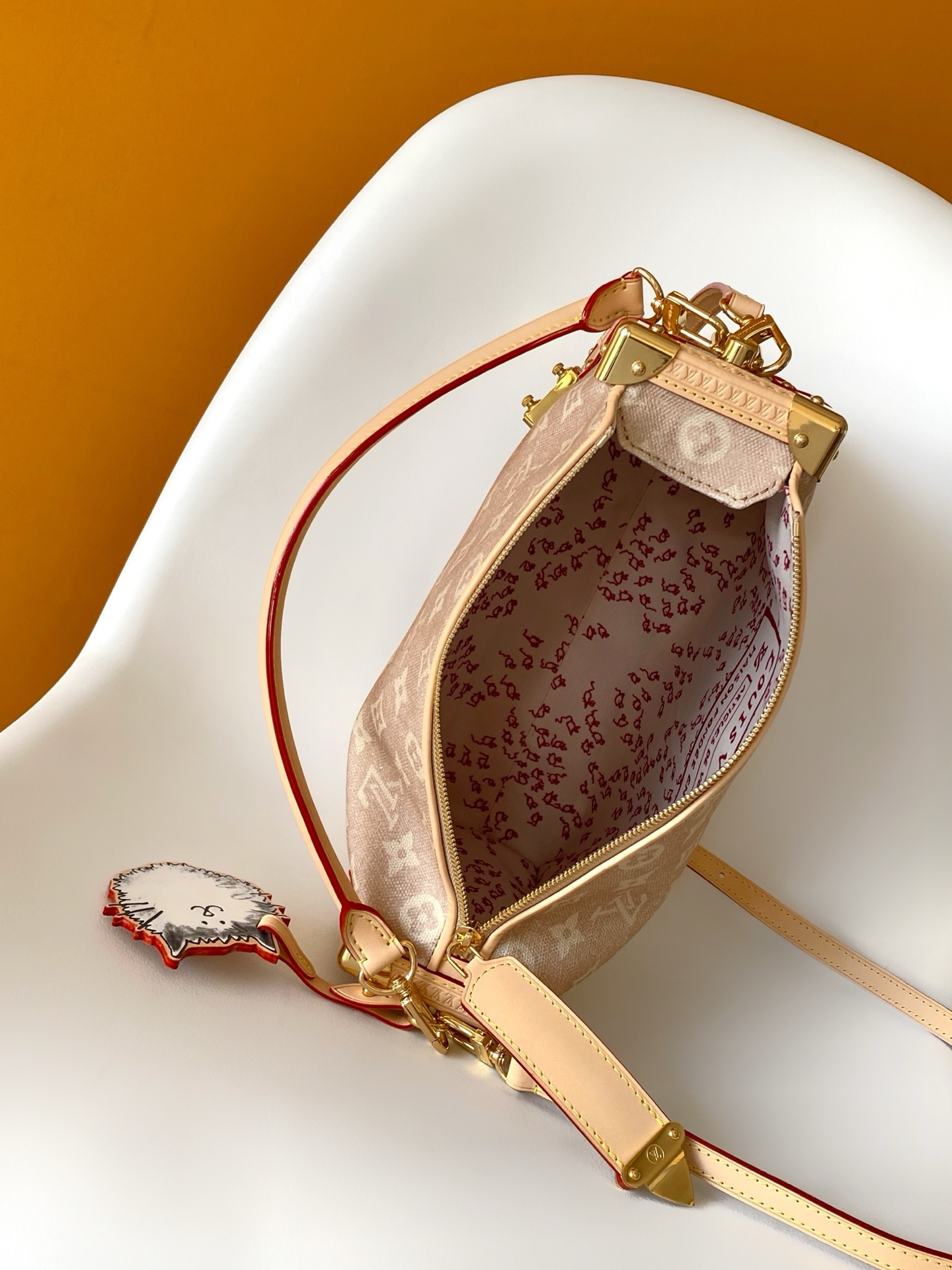 Louis Vuitton This "LV Travels With" edition of the large Side Trunk handbag showcases the brand's collaboration with a fashion icon and artist.