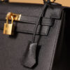 Hermes Kelly bag, black, 25cm, with gold hardware.