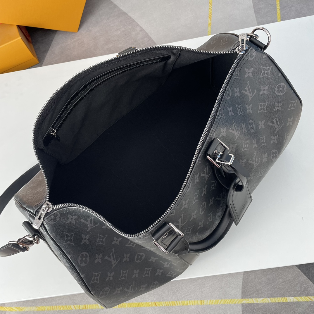 Louis Vuitton The Keepall 50 travel bag, crafted from the new, iconic black and grey Monogram Eclipse canvas.
