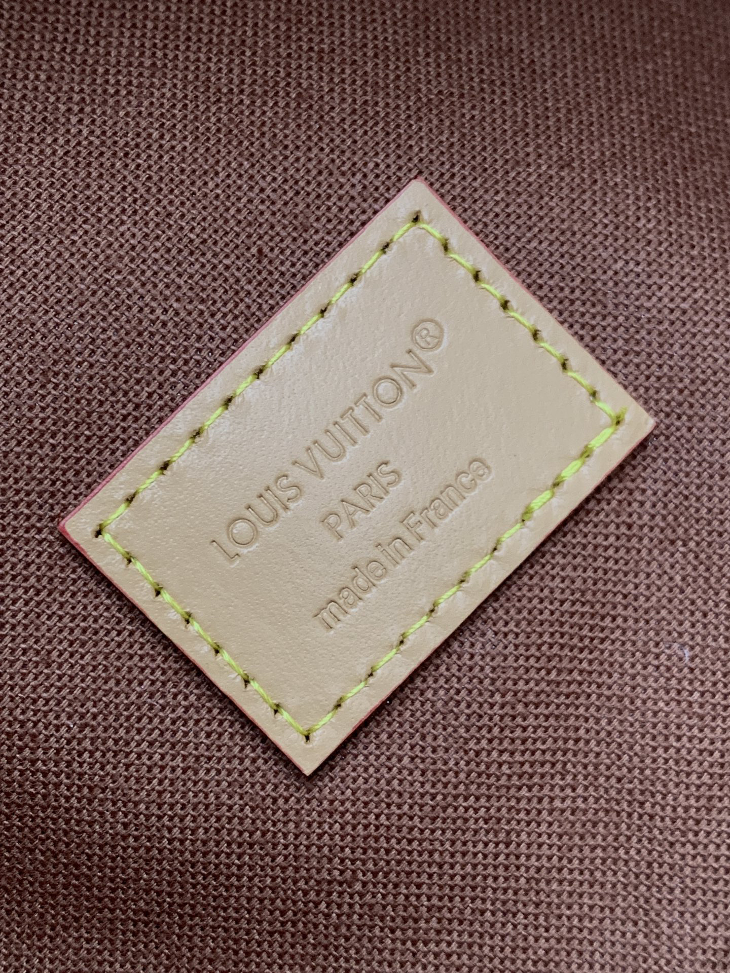 Louis Vuitton This Discovery Small Backpack features Monogram canvas accented with Monogram Reverse and Damier canvas patches.