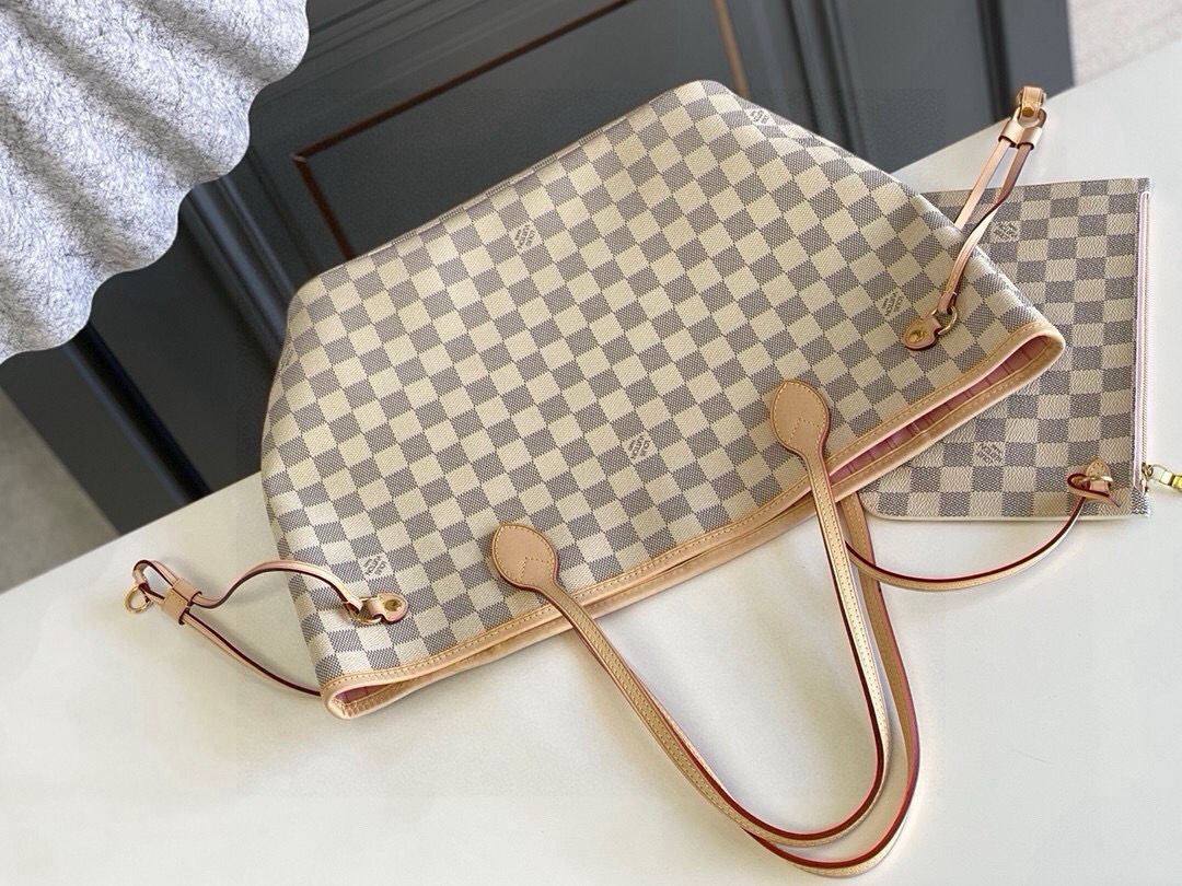Louis Vuitton The legendary Neverfull handbag: always ready to meet your every need.