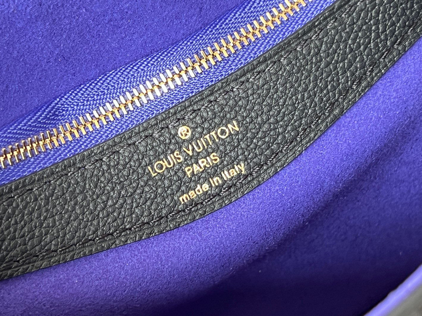 Louis Vuitton This Diane handbag is crafted from Louis Vuitton's classic Monogram Empreinte embossed leather.