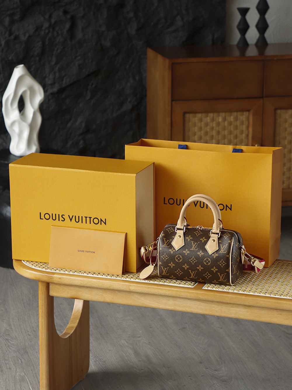 Louis Vuitton The Speedy Bandoulière 20 carries the DNA of a century-old heritage, featuring an iconic, three-dimensional "pillow" silhouette that is both sleek and structured.