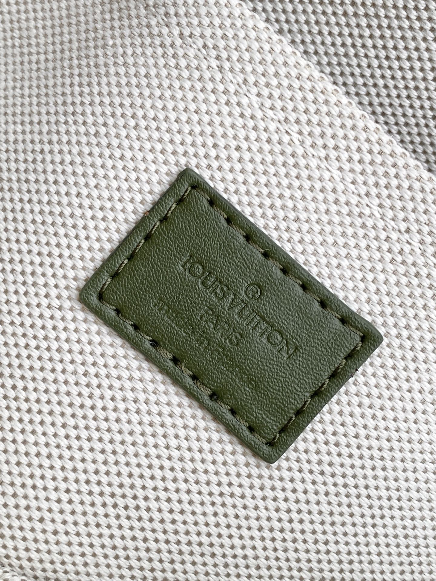 Louis Vuitton This Nil crossbody bag features a vintage silhouette crafted from Monogram Heritage canvas.