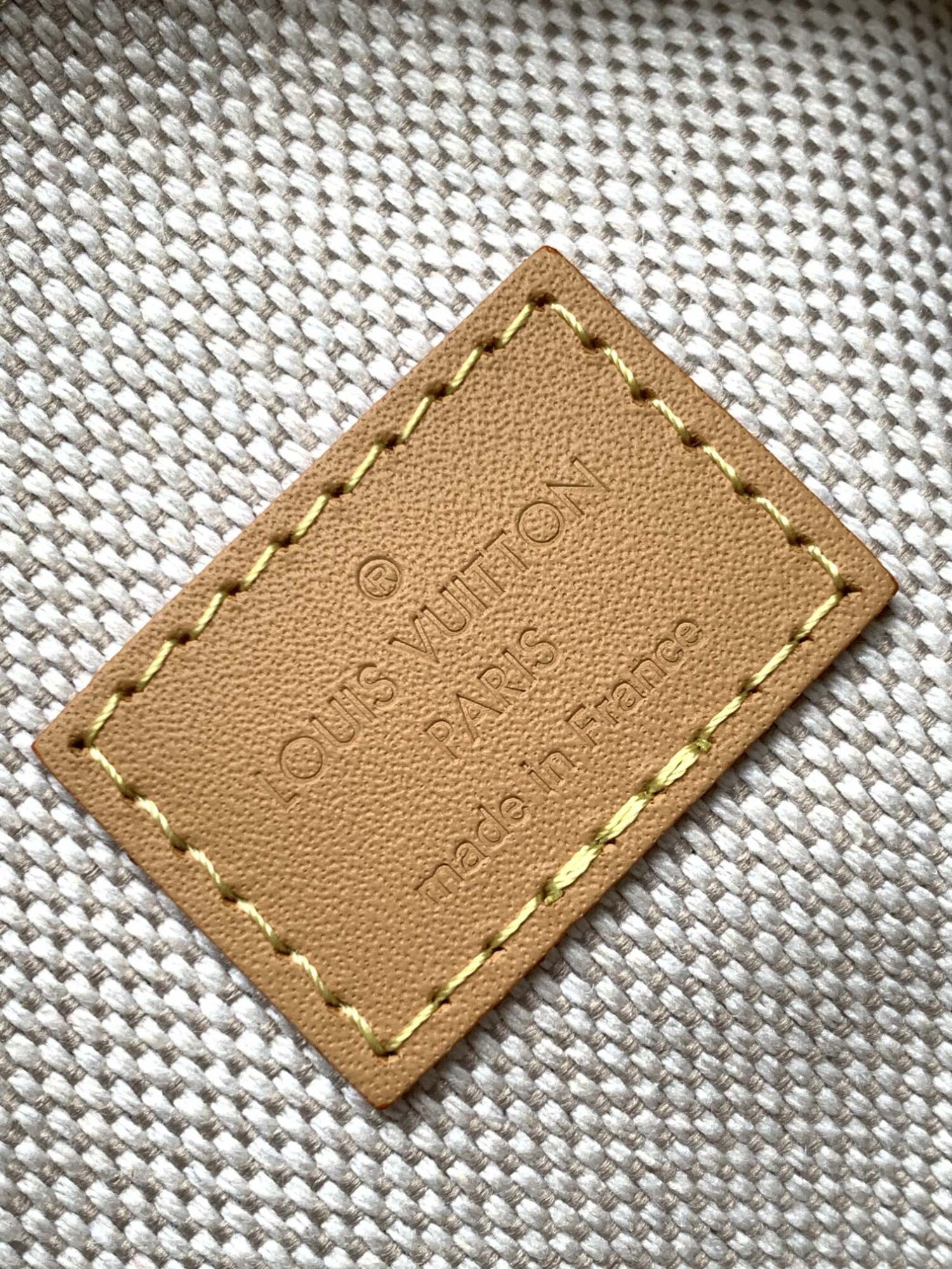 Louis Vuitton N40682 — FW New Denim Collection. The Sunset bag takes center stage in Monogram Denim canvas.