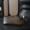 Louis Vuitton Crafted from classic Monogram canvas, this small Boulogne handbag features a double-zip closure and a spacious interior flat pocket large enough to accommodate a smartphone.