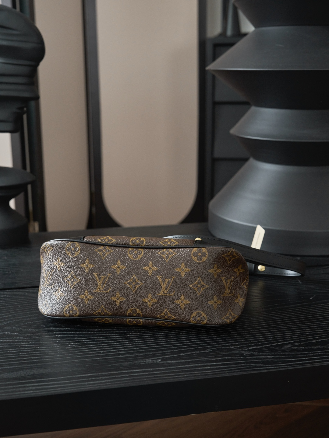 Louis Vuitton Crafted from classic Monogram canvas, this small Boulogne handbag features a double-zip closure and a spacious interior flat pocket large enough to accommodate a smartphone.