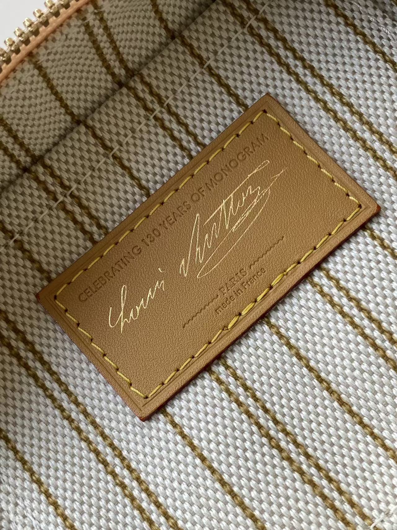 Louis VuittonThis Speedy Bandoulière 20 handbag encapsulates the design of the brand's traditional Speedy travel bag.