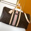 Louis Vuitton The Keepall Bandoulière 55 travel bag cleverly utilizes Monogram canvas to create ample space.