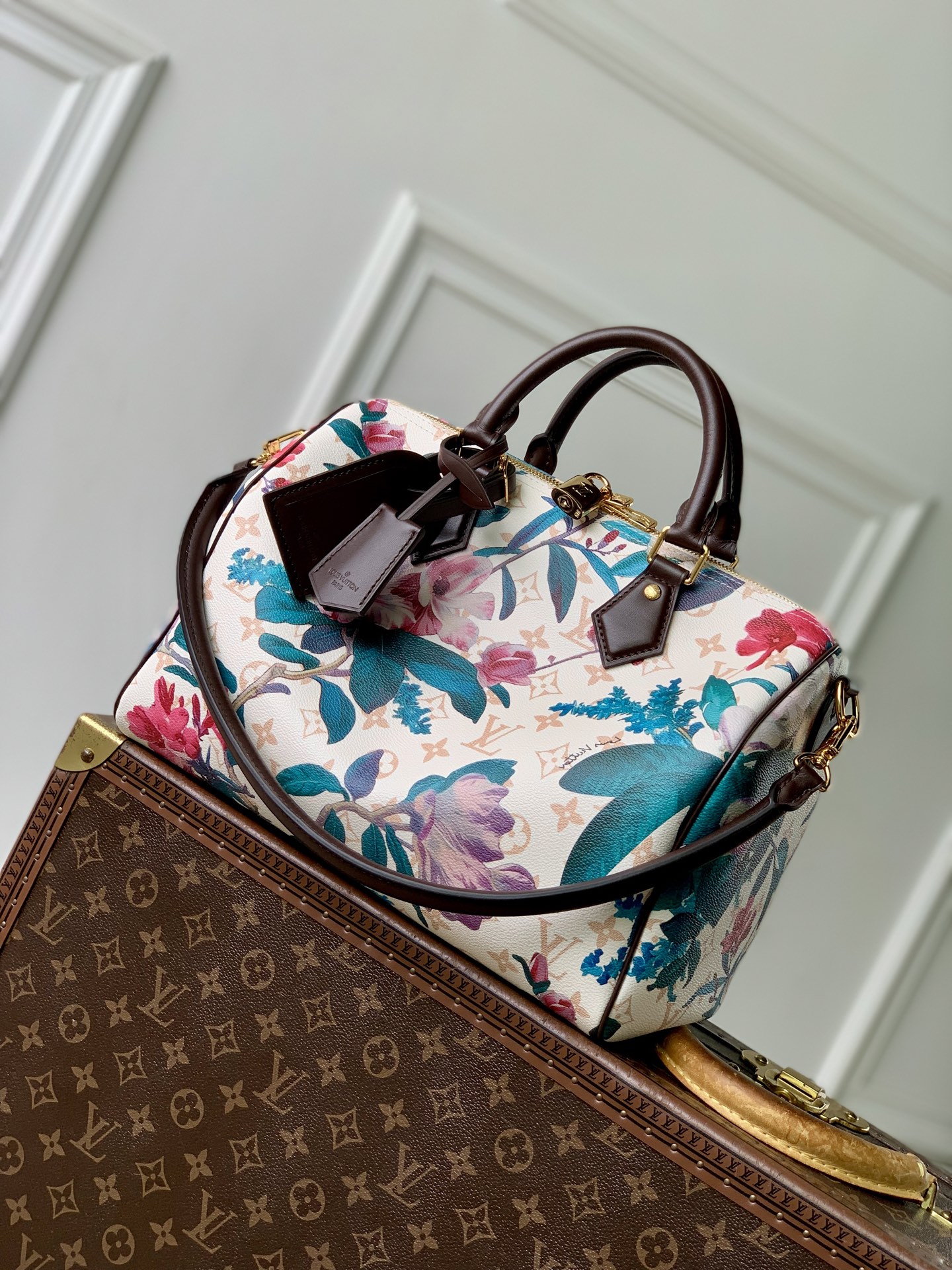Louis Vuitton The M29066 floral Speedy 30 Soft handbag is from the Monogram Eden collection.