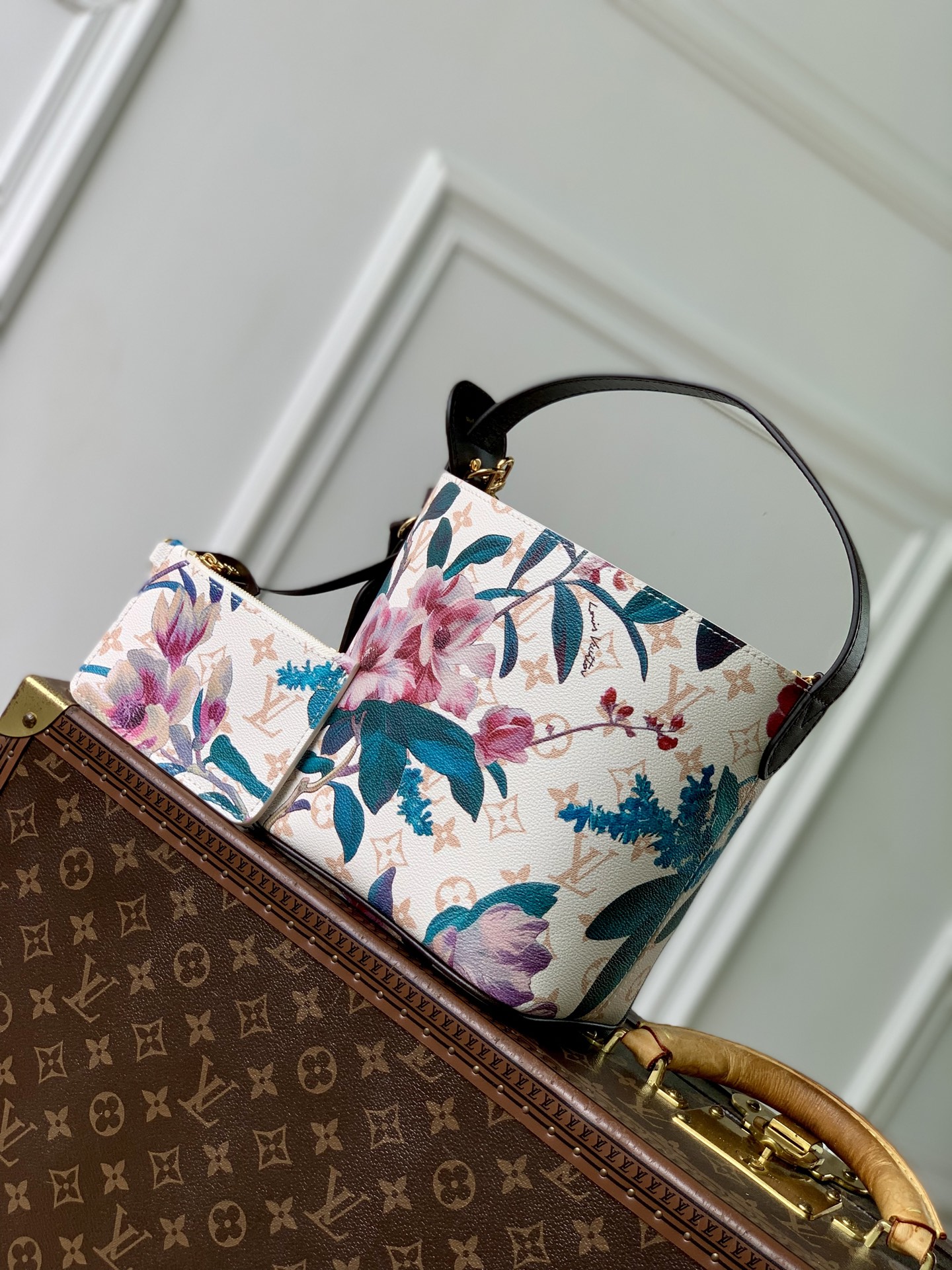 Louis Vuitton The M29067 floral all-in-one BB handbag is from the Monogram Eden collection.