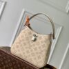 Louis Vuitton M27459 Off-white All Around small handbag from the Mahina series.