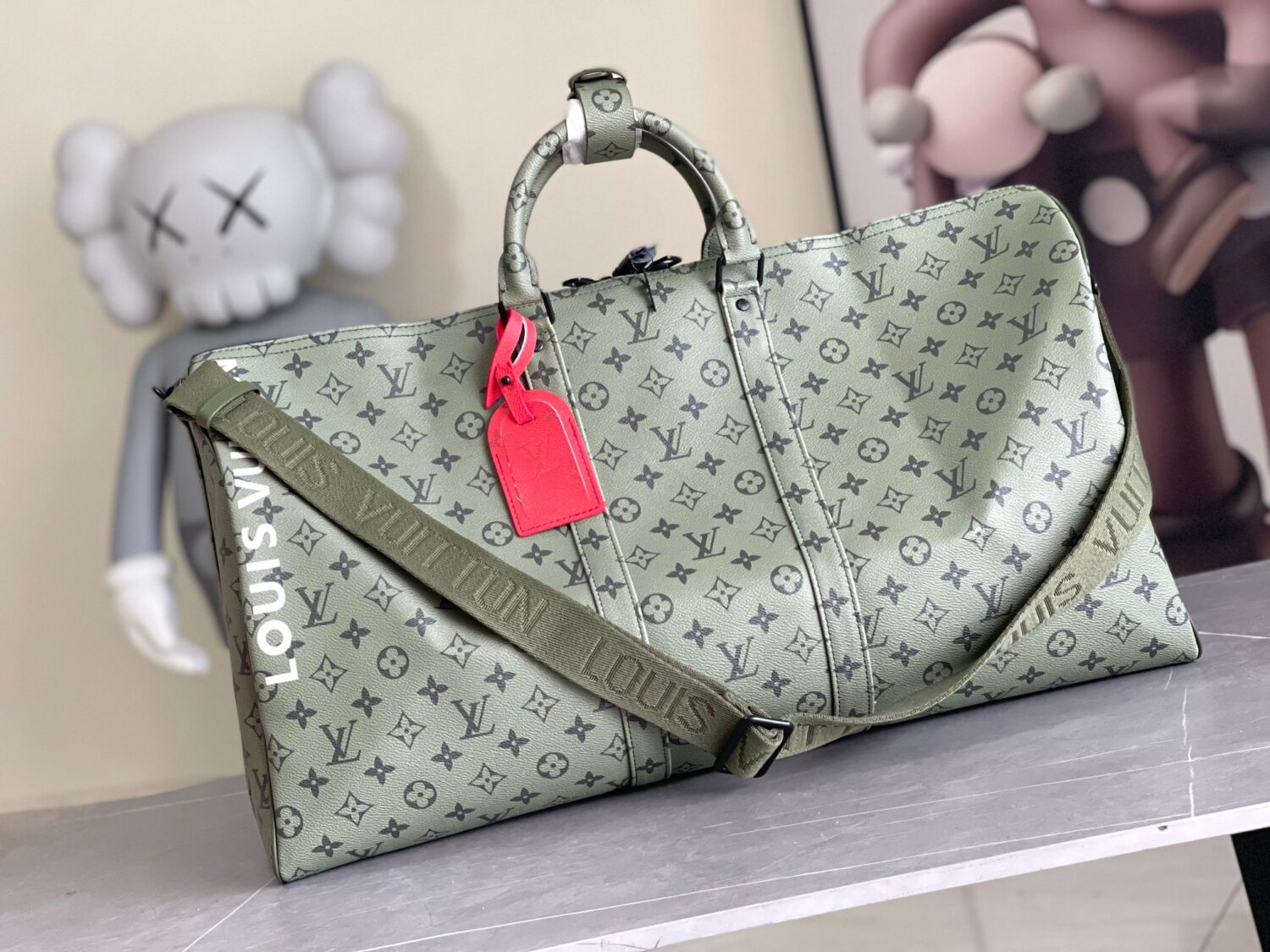 Louis Vuitton Keepall size 45 travel bag, style numbers 23962 and 23963, dyed in a pastel hue reminiscent of the rising sun.