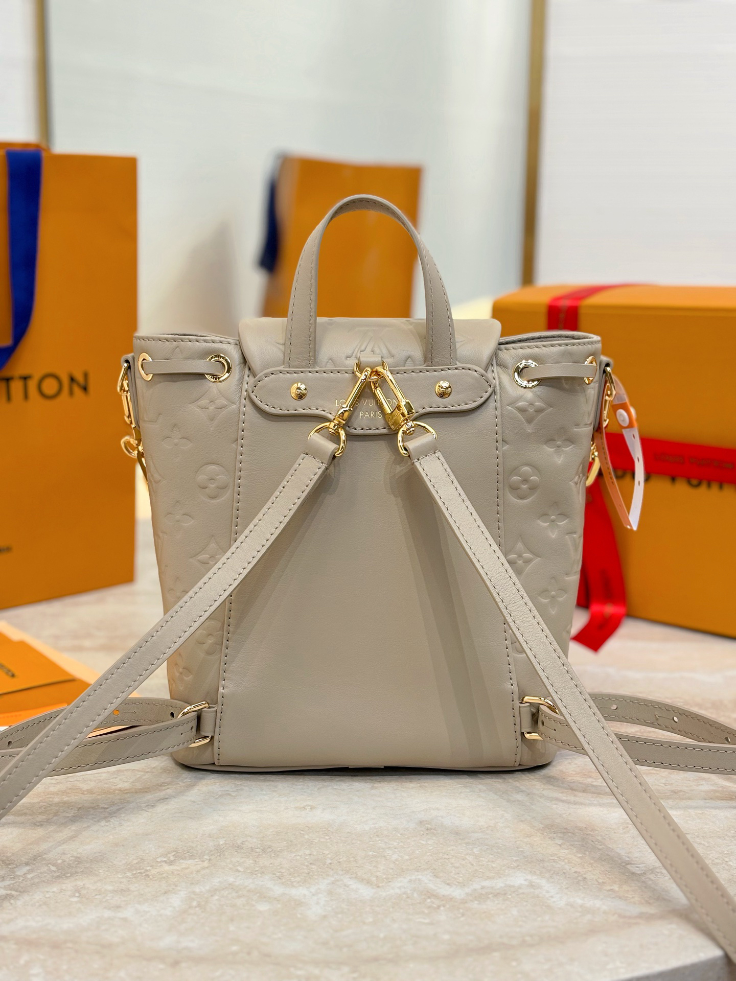 Louis Vuitton The Coussin Backpack small handbag, featuring a striking backpack design, joins the Coussin collection.