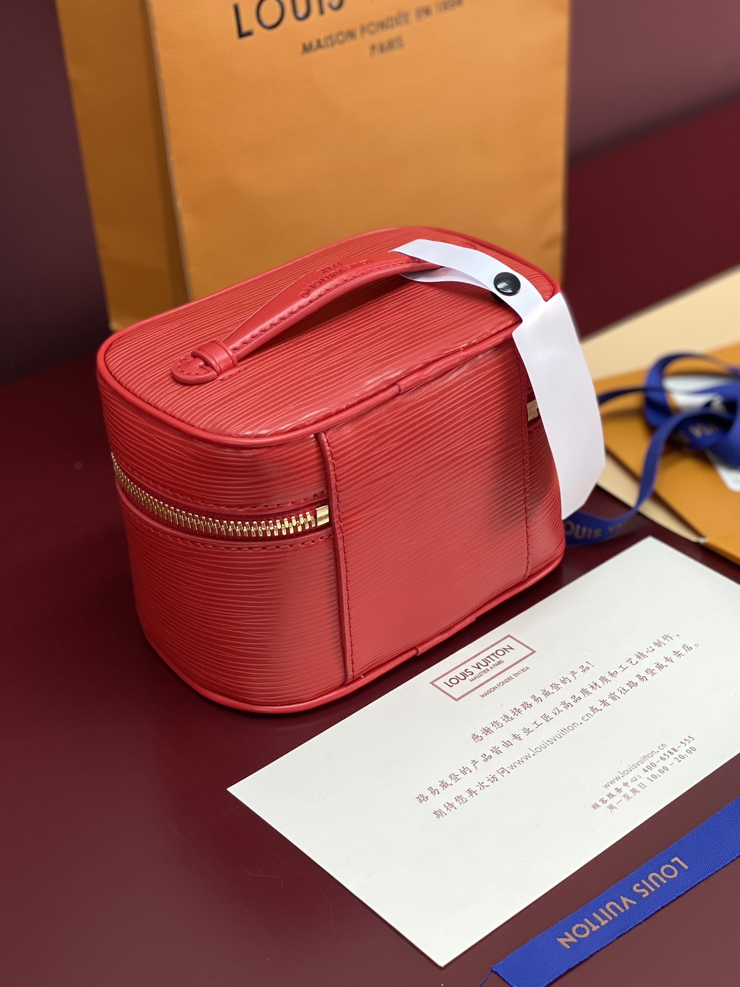 Louis Vuitton M25855 Red Small! New Season NICE NANO Bag with Grain Texture. This Nice Nano bag features a grained finish.
