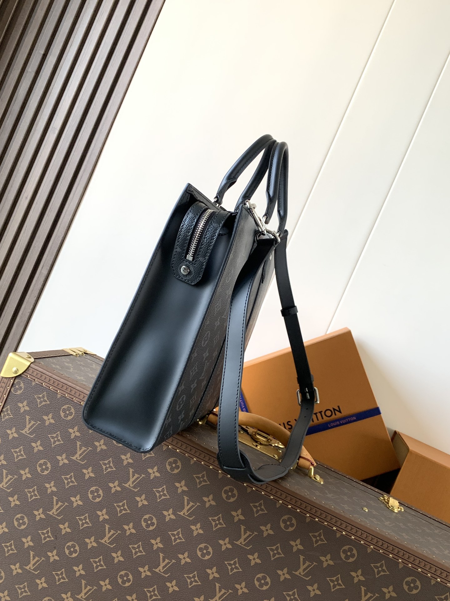Louis Vuitton The M11742 black floral briefcase with zipper and 163C microcode chip is a Sac Plat 24H handbag with the elegant style of Monogram Eclipse coated canvas.