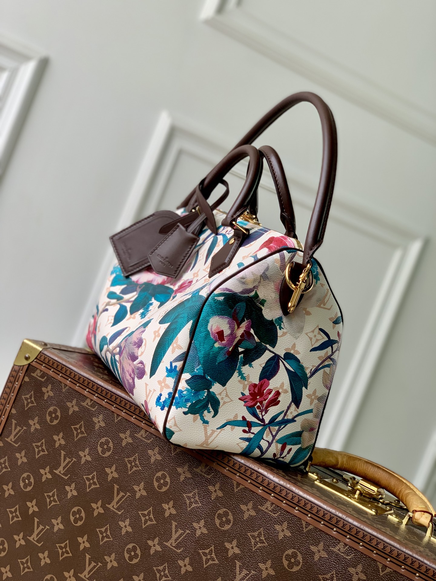 Louis Vuitton The M29066 floral Speedy 30 Soft handbag is from the Monogram Eden collection.