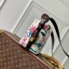 Louis Vuitton The M29067 floral all-in-one BB handbag is from the Monogram Eden collection.