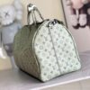 Louis Vuitton Keepall size 45 travel bag, style numbers 23962 and 23963, dyed in a pastel hue reminiscent of the rising sun.