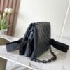 Louis Vuitton M11370 Black embossed leather bag with black chain.