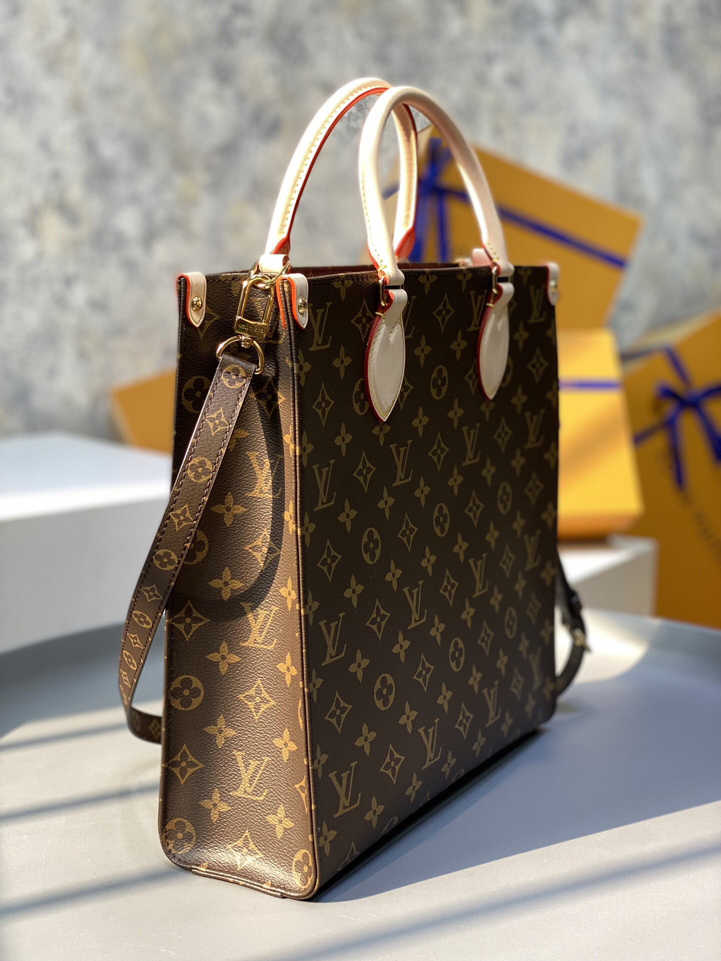 Louis Vuitton The M45848 classic Sac Plat medium handbag incorporates contemporary trends with its Monogram canvas and leather trim.