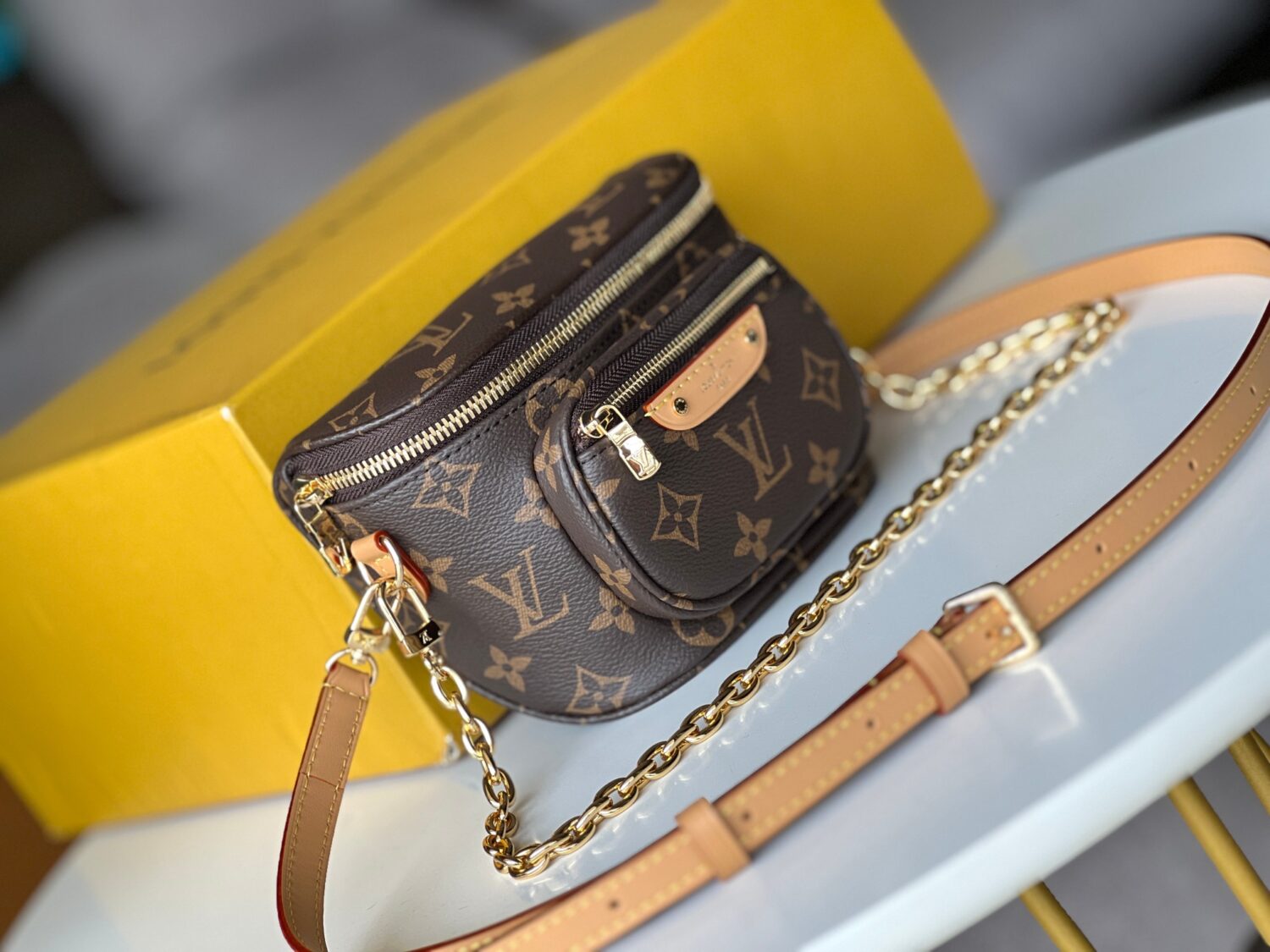 Louis Vuitton【Mini Bumbag】M82335 Monogram Canvas This Mini Bumbag is from the LV Gradient series.
