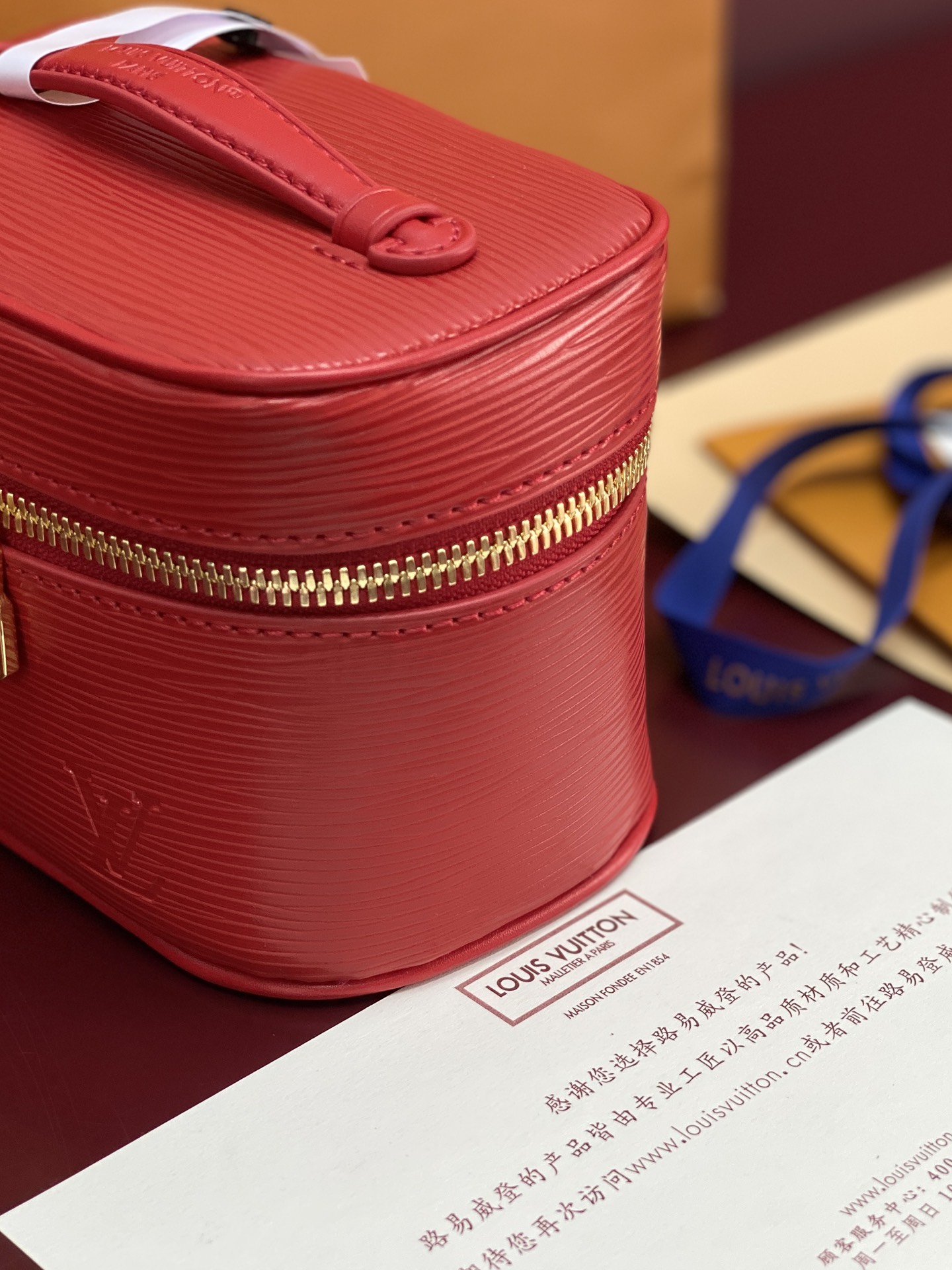 Louis Vuitton M25855 Red Small! New Season NICE NANO Bag with Grain Texture. This Nice Nano bag features a grained finish.