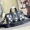 Louis Vuitton M46406 Black Floral Polka Dot Yayoi Kusama Handbag: This handbag encapsulates the classic silhouette of a travel bag and is crafted from embossed leather.