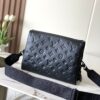 Louis Vuitton M11370 Black embossed leather bag with black chain.