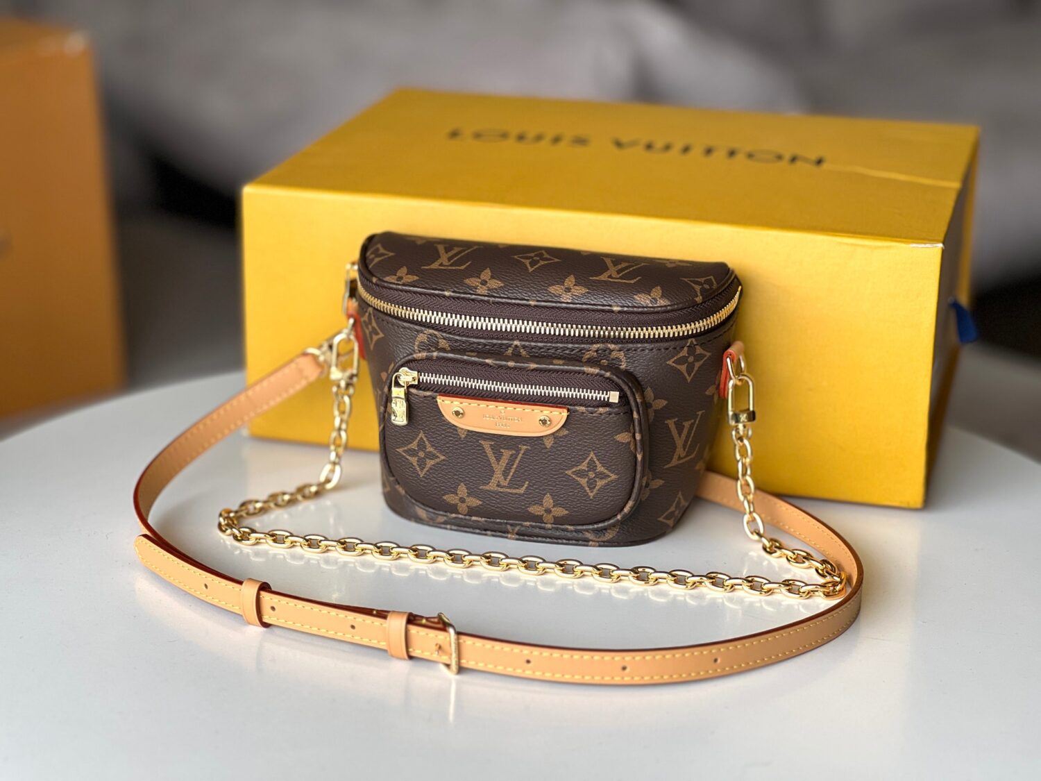 Louis Vuitton【Mini Bumbag】M82335 Monogram Canvas This Mini Bumbag is from the LV Gradient series.