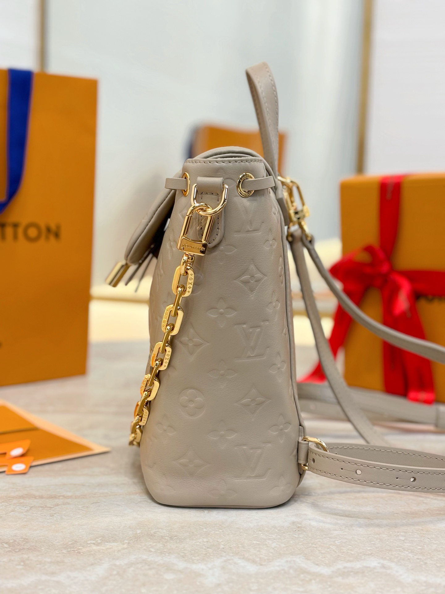 Louis Vuitton The Coussin Backpack small handbag, featuring a striking backpack design, joins the Coussin collection.