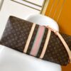 Louis Vuitton The Keepall Bandoulière 55 travel bag cleverly utilizes Monogram canvas to create ample space.