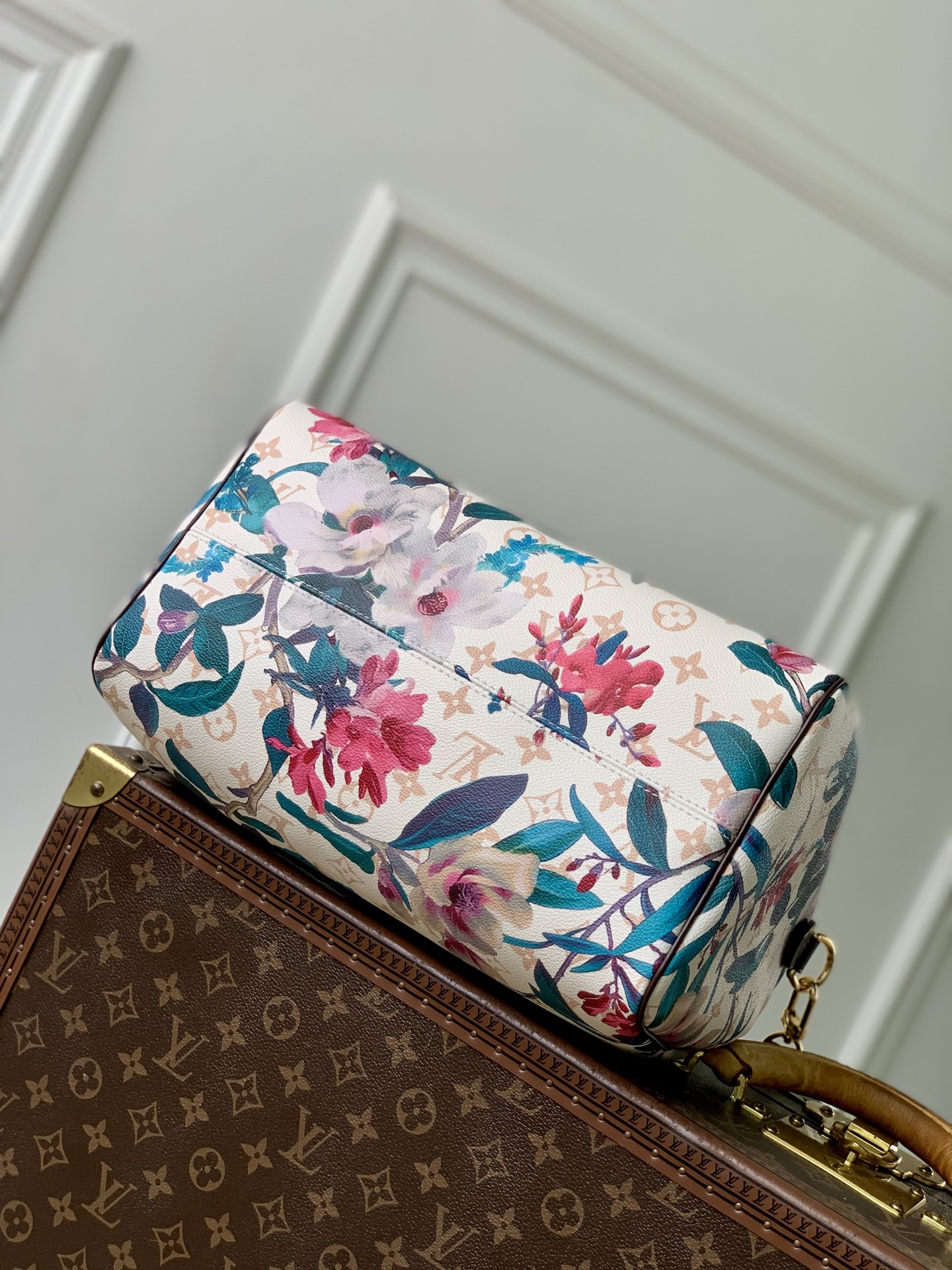 Louis Vuitton The M29066 floral Speedy 30 Soft handbag is from the Monogram Eden collection.