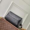 Louis Vuitton The M23807 black Speedy P9 Bandoulière 20 handbag is crafted from glossy calfskin leather.