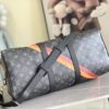 Louis Vuitton 01949 Rose Red. 13808 Red This Keepall Bandoulière 45 travel bag is