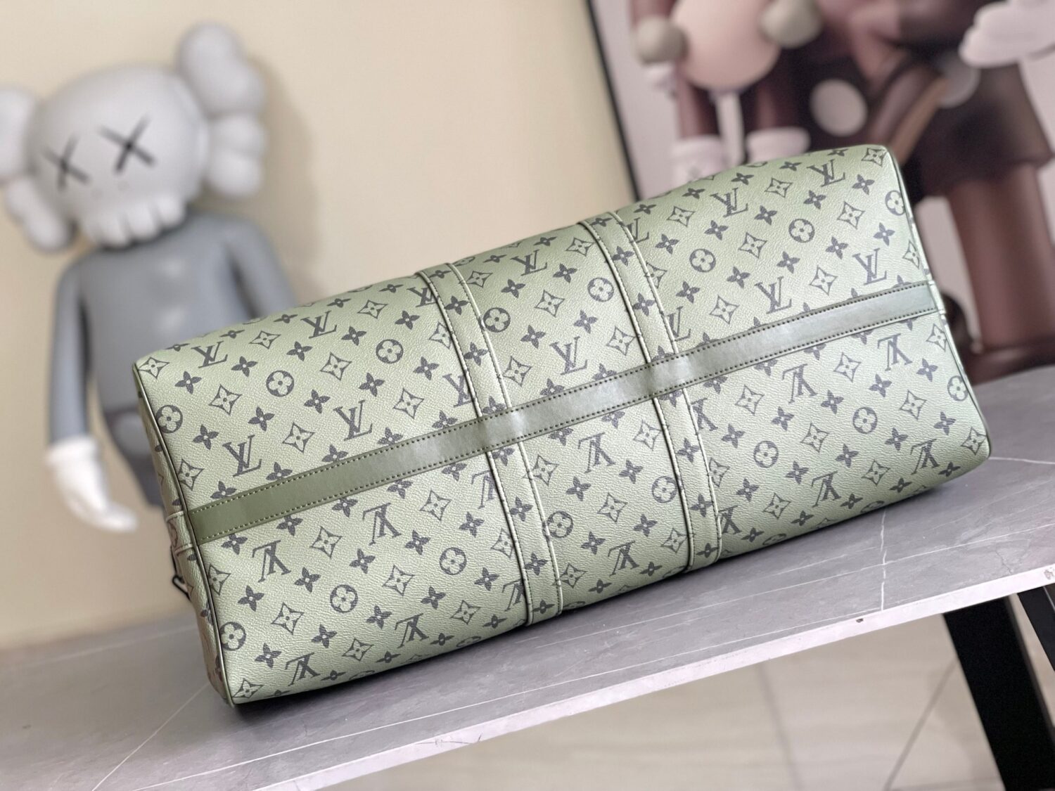 Louis Vuitton Keepall size 45 travel bag, style numbers 23962 and 23963, dyed in a pastel hue reminiscent of the rising sun.