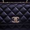 Chanel 25s handle with diamond embellishment