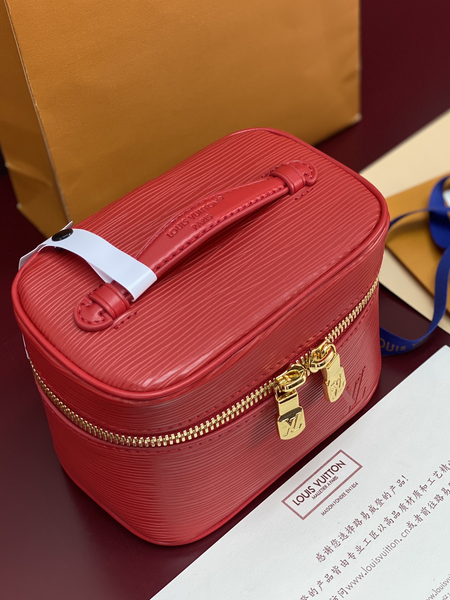 Louis Vuitton M25855 Red Small! New Season NICE NANO Bag with Grain Texture. This Nice Nano bag features a grained finish.