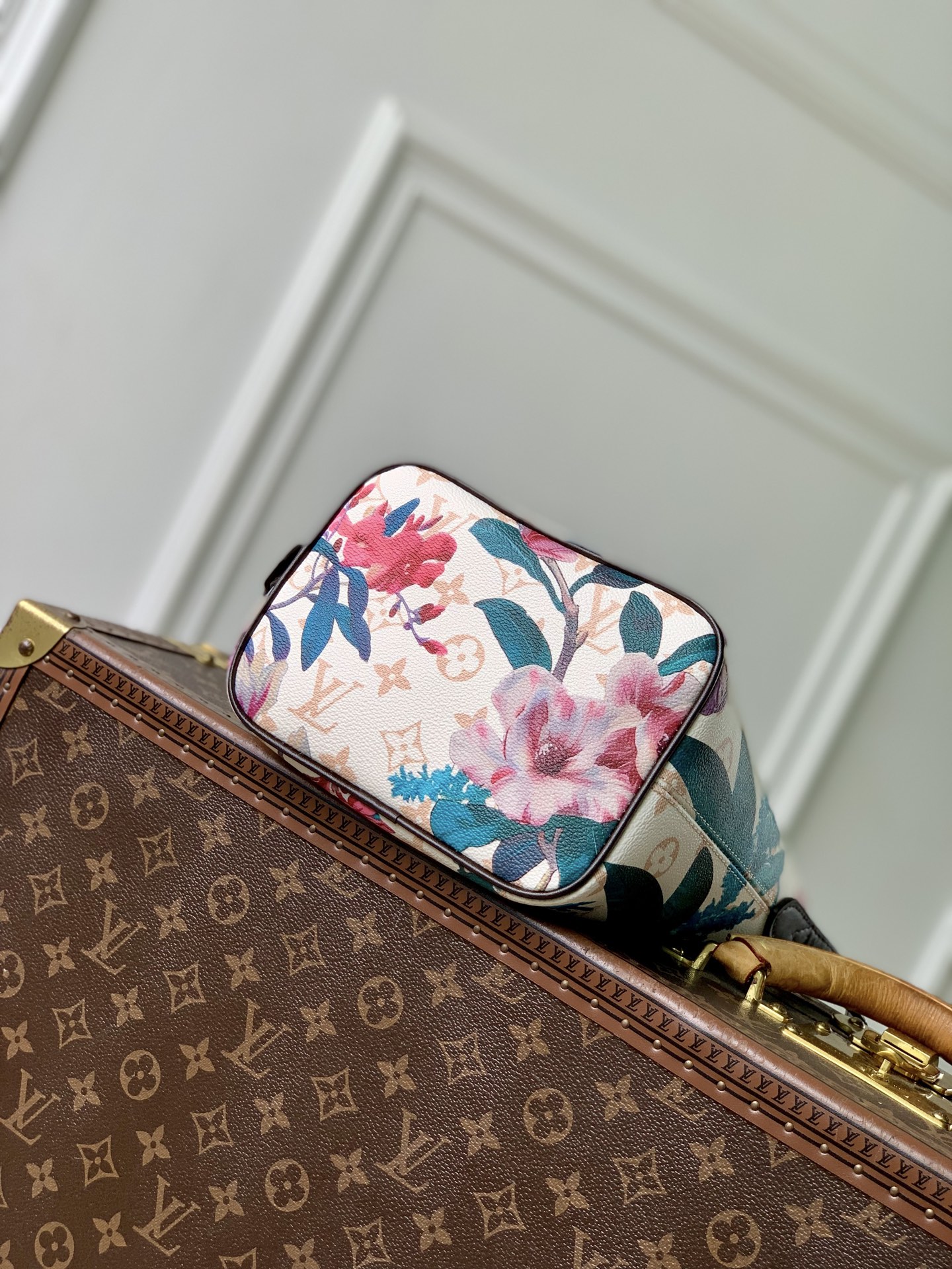 Louis Vuitton The M29067 floral all-in-one BB handbag is from the Monogram Eden collection.
