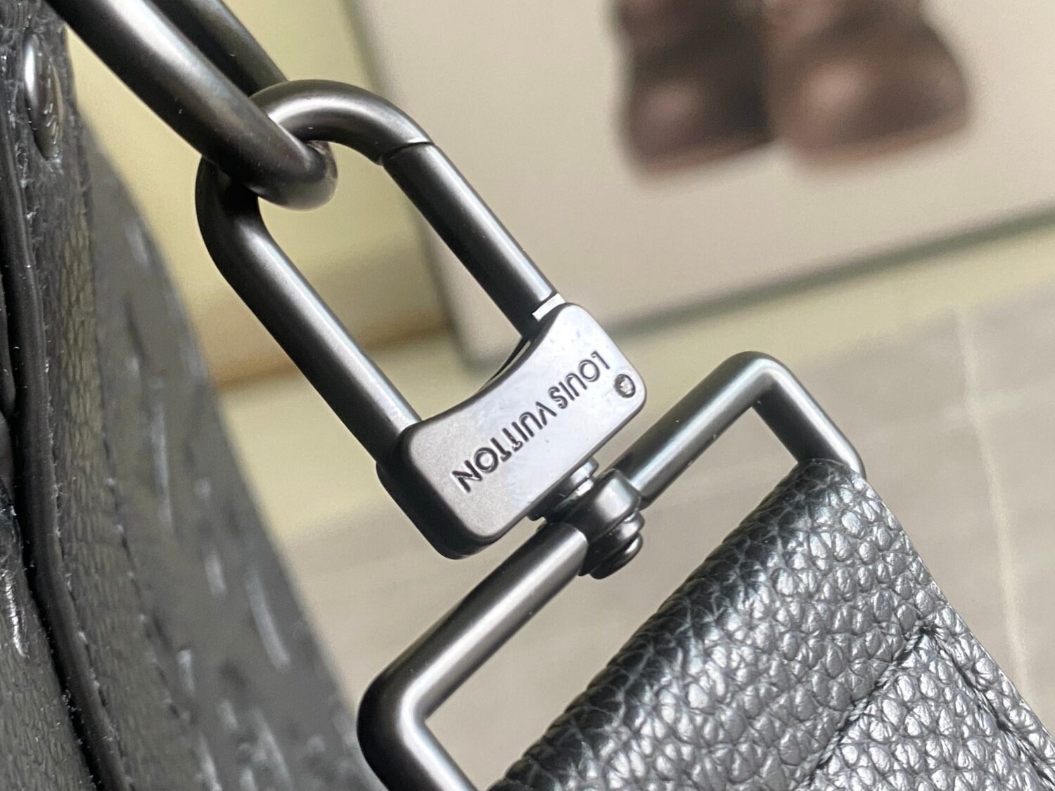 Louis Vuitton The new version of the M44810 Keepall Bandoulière 50 travel bag features the Monogram Shadow design.