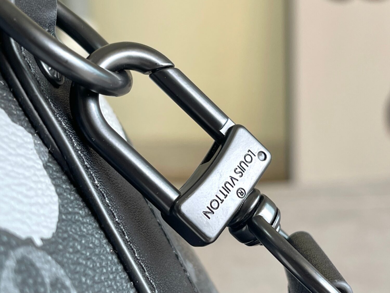 Louis Vuitton M46406 Black Floral Polka Dot Yayoi Kusama Handbag: This handbag encapsulates the classic silhouette of a travel bag and is crafted from embossed leather.