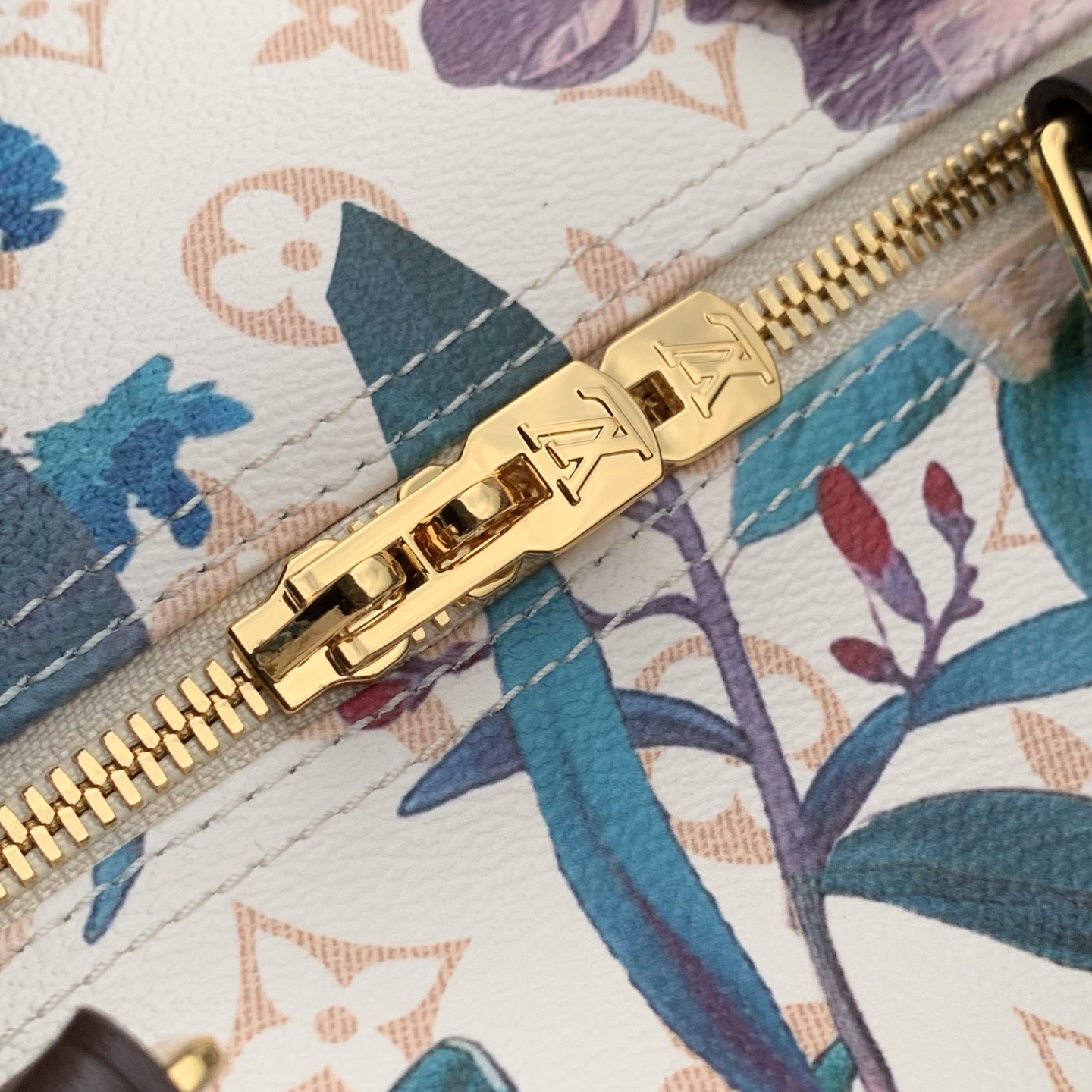 Louis Vuitton The M29066 floral Speedy 30 Soft handbag is from the Monogram Eden collection.