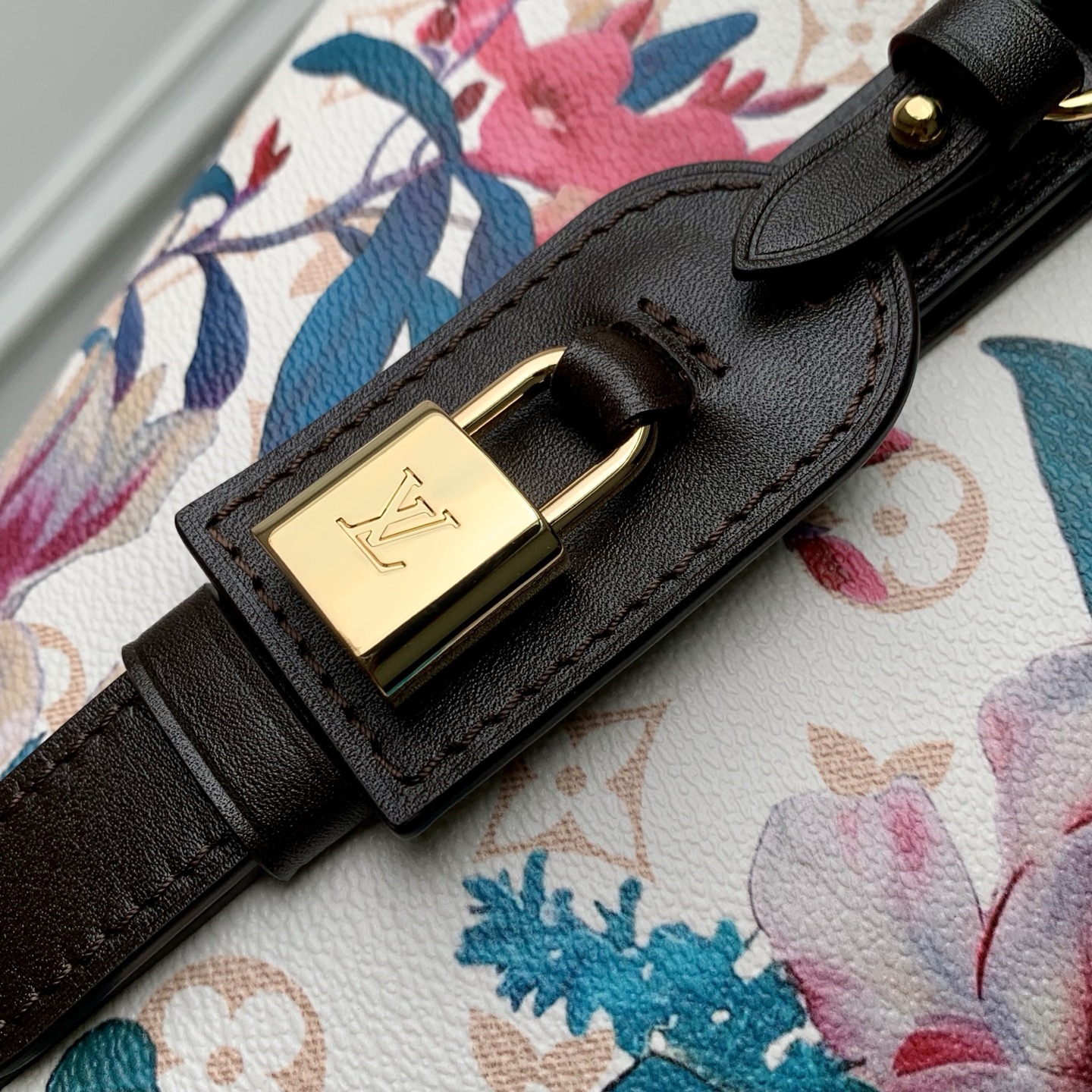 Louis Vuitton The M29067 floral all-in-one BB handbag is from the Monogram Eden collection.