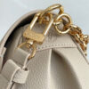 Louis Vuitton The M46393 Favorite handbag is crafted from Monogram Empreinte embossed leather.