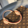 Louis Vuitton The M45848 classic Sac Plat medium handbag incorporates contemporary trends with its Monogram canvas and leather trim.