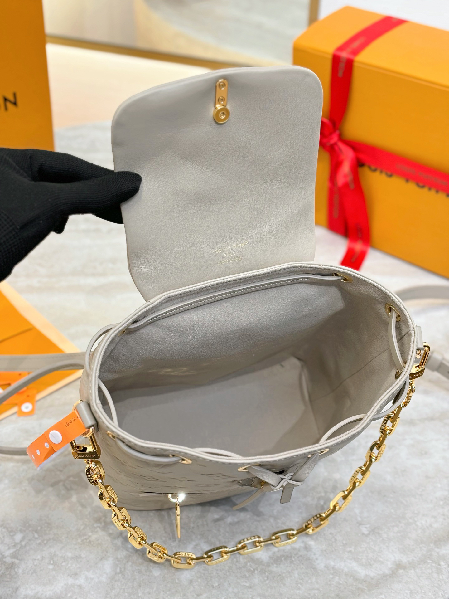 Louis Vuitton The Coussin Backpack small handbag, featuring a striking backpack design, joins the Coussin collection.