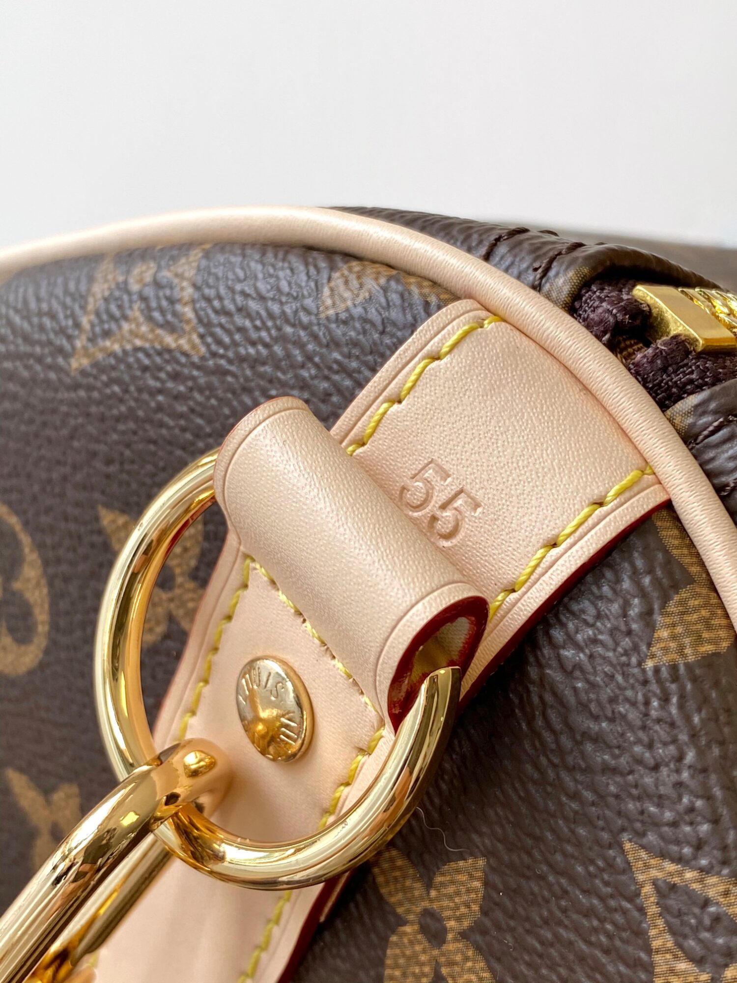 Louis Vuitton The Keepall Bandoulière 55 travel bag cleverly utilizes Monogram canvas to create ample space.