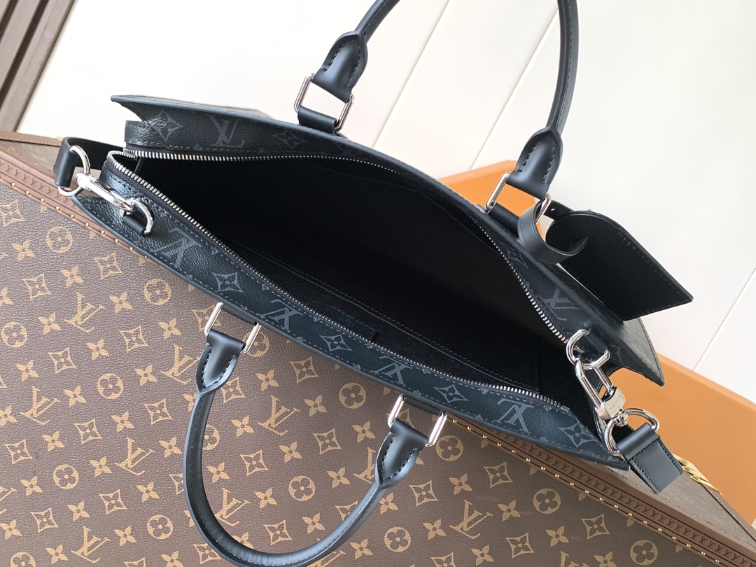 Louis Vuitton The M11742 black floral briefcase with zipper and 163C microcode chip is a Sac Plat 24H handbag with the elegant style of Monogram Eclipse coated canvas.