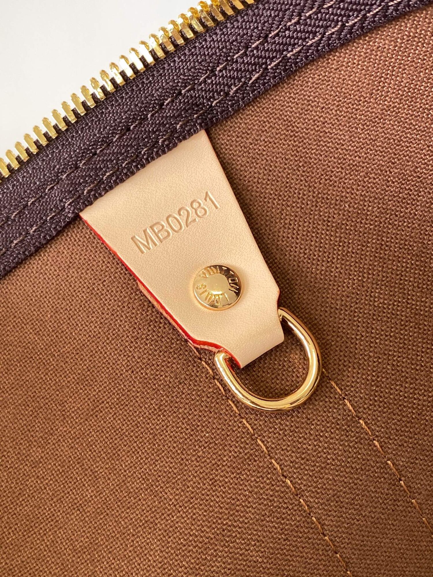 Louis Vuitton The Keepall Bandoulière 55 travel bag cleverly utilizes Monogram canvas to create ample space.